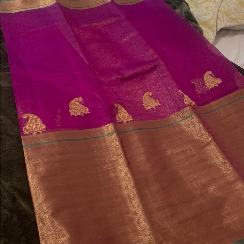 Brand new sari in a beautiful purple color.